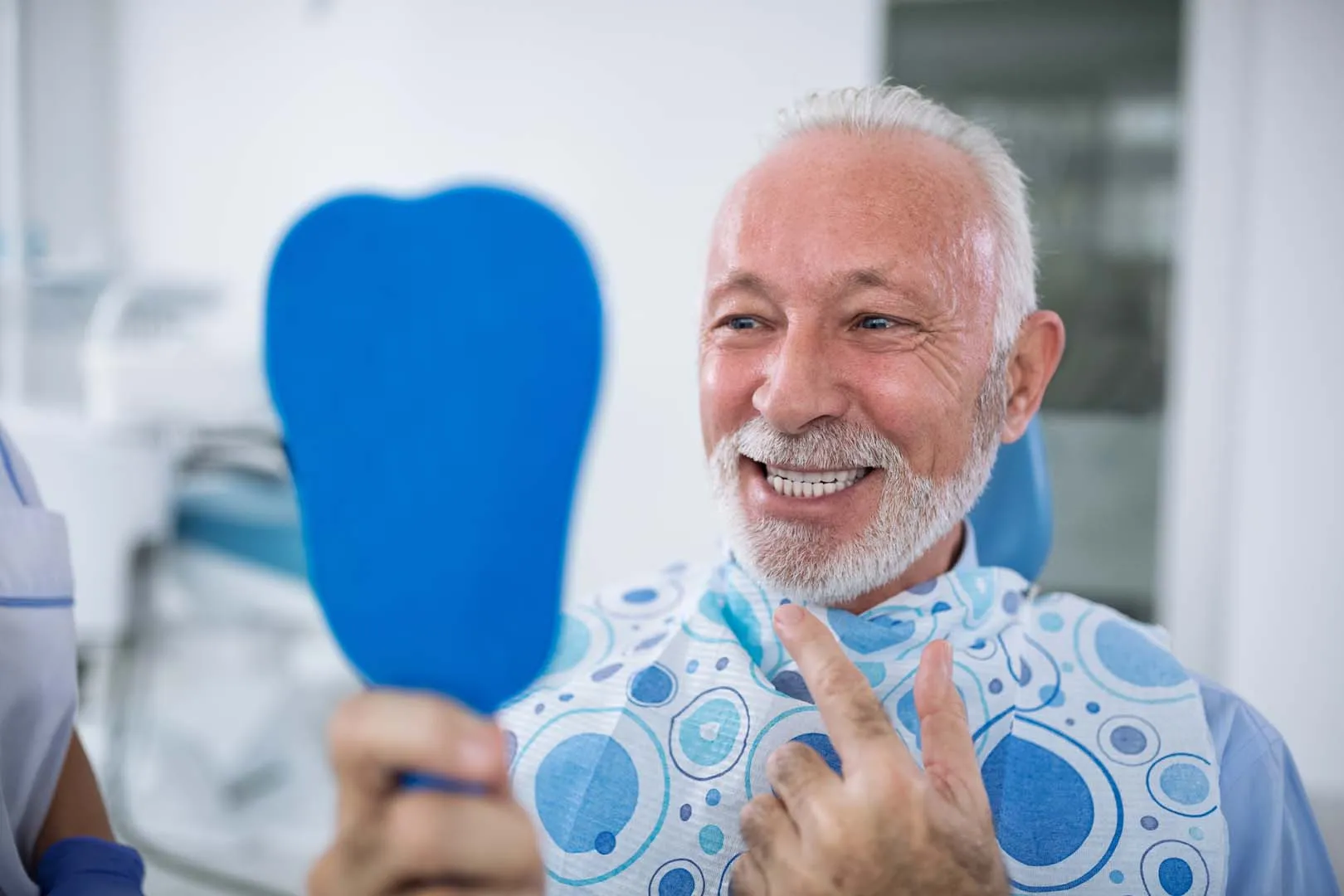 Dr. Israel providing care at Riverwalk Dental Group