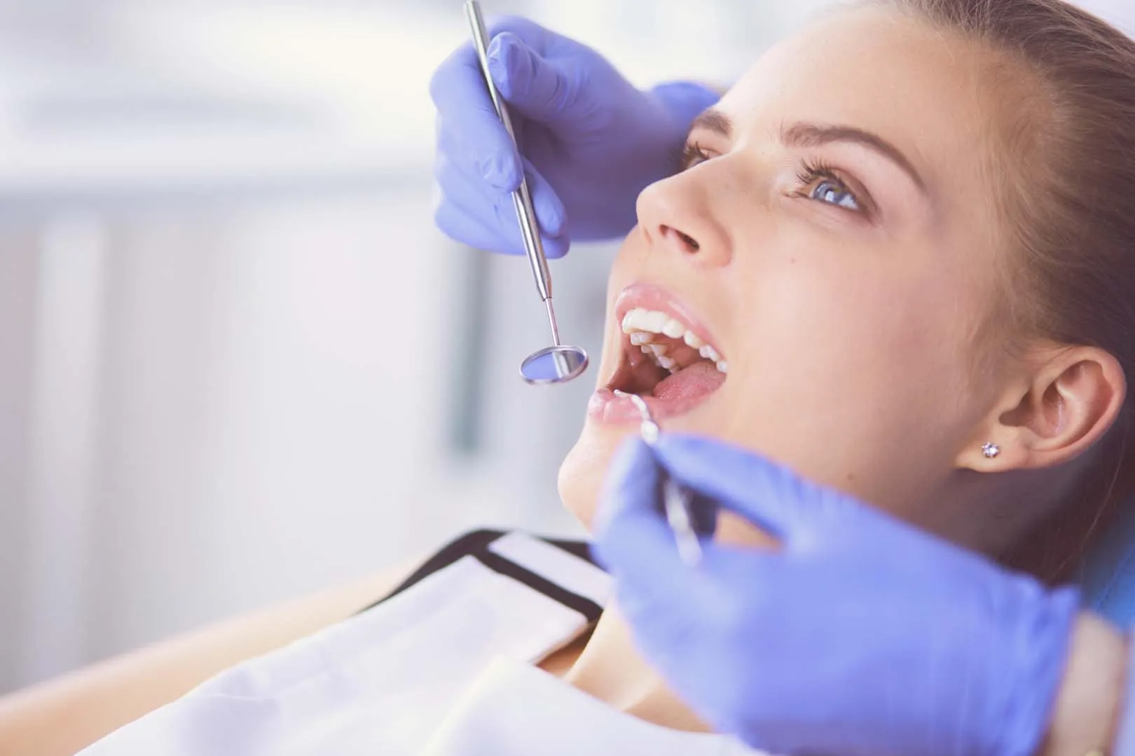 Dr. Ariana Romero Guerra providing care at Riverwalk Dental Group